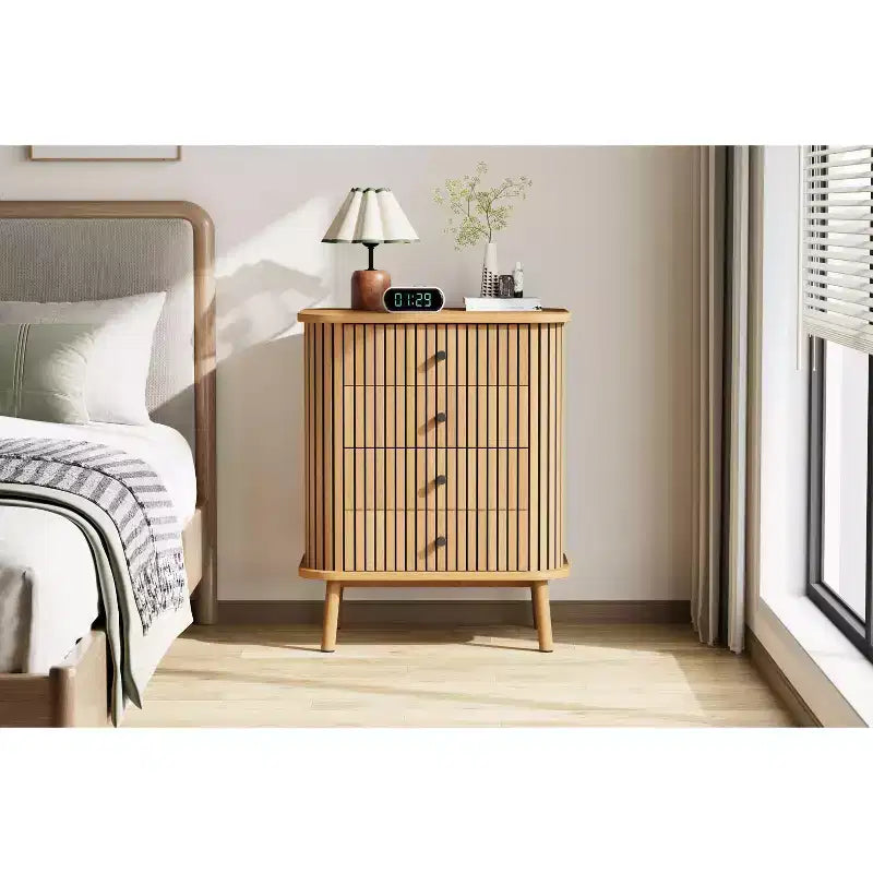 4 drawer dresser , bedroom chest of drawers , storage cabinet , ample space , modern wicker dresser with matte black handles and wooden legs